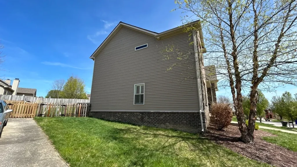Residential vinyl siding installed on a two story home in Lexington Kentucky