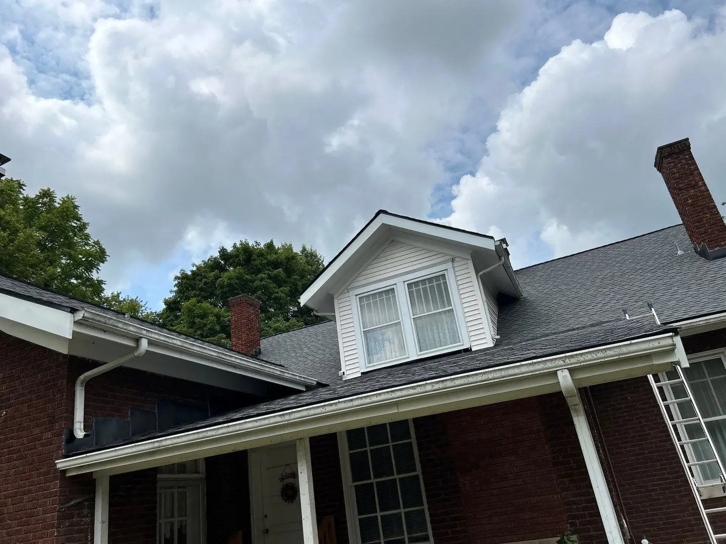 Dormer roof installation on asphalt shingle roof in Lexington KY residential home