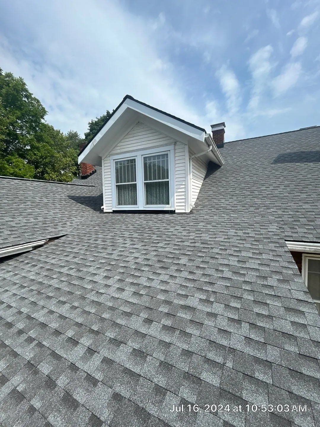 Dormer roof with new asphalt shingles and proper flashing in Lexington KY