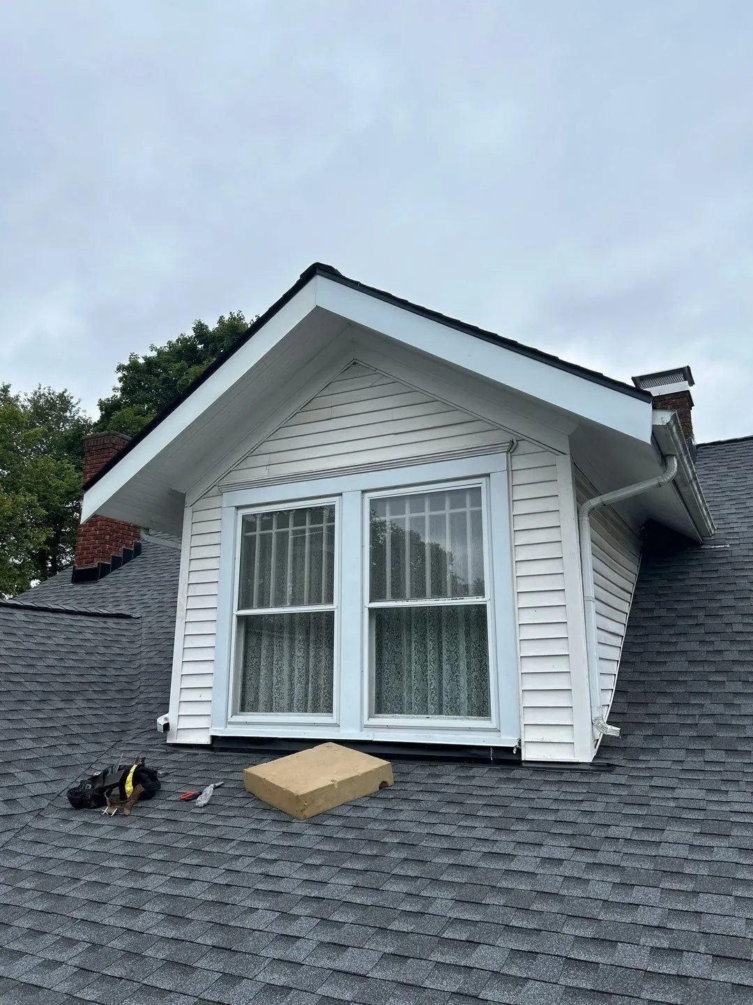 Dormer roof repair on asphalt shingle roof in Lexington KY residential home
