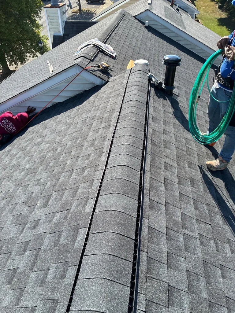 Roof ridge cap repair and ventilation installation on asphalt shingle roof in Lexington KY