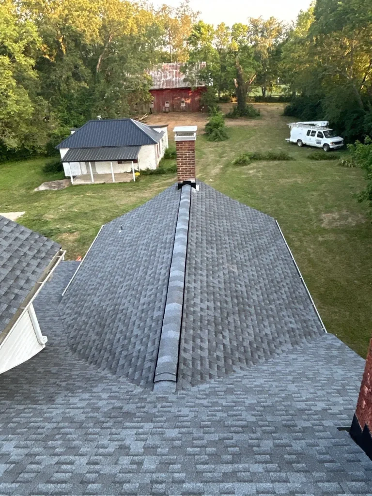 Roof repair on residential home in Lexington KY with asphalt shingle roofing system