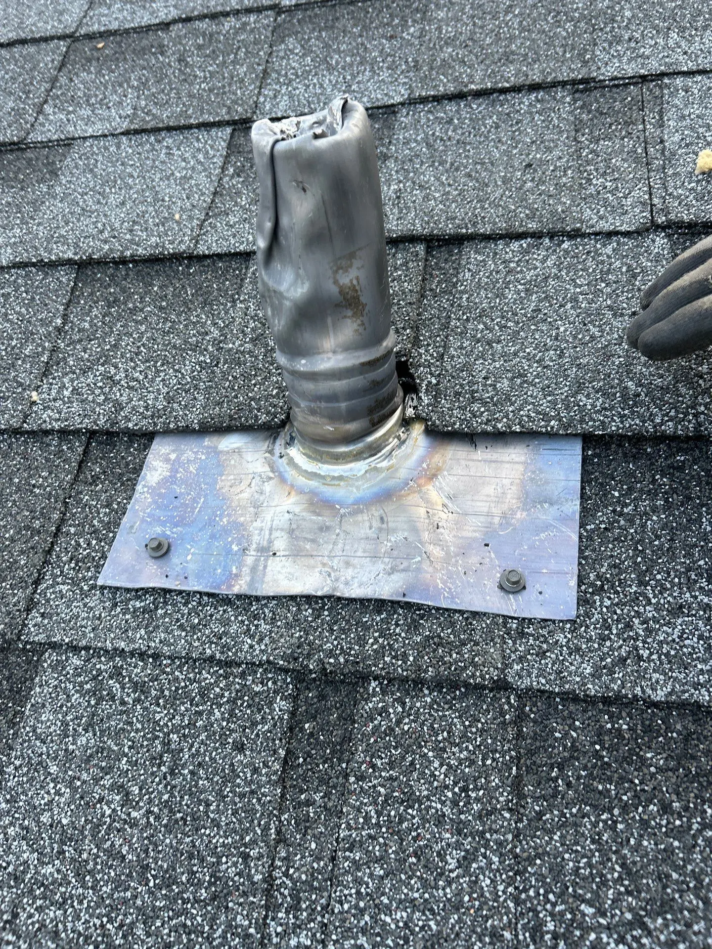 Damaged roof vent penetration and flashing on asphalt shingle roof in Lexington KY