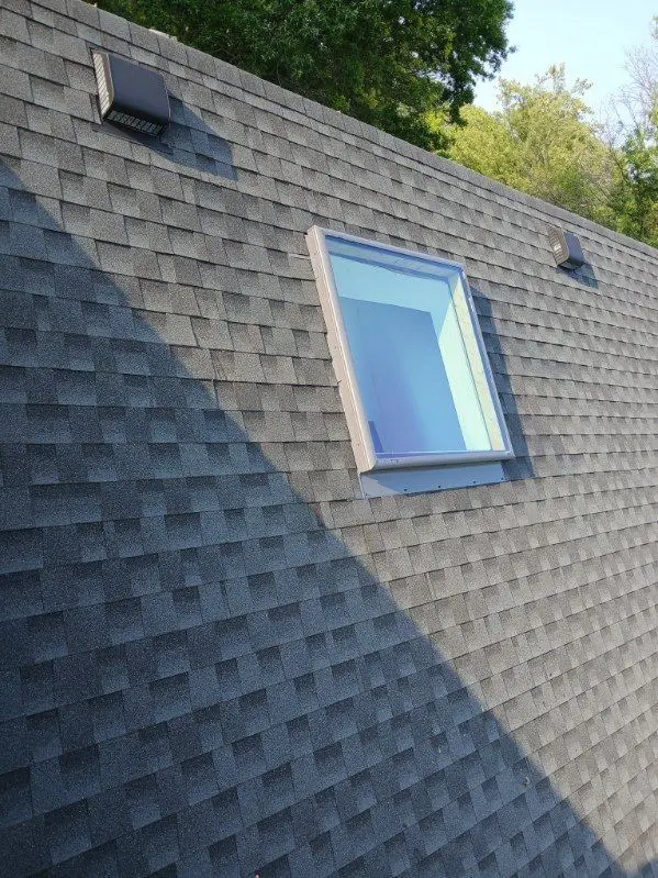 Skylight installation on asphalt shingle roof in Paris KY residential home