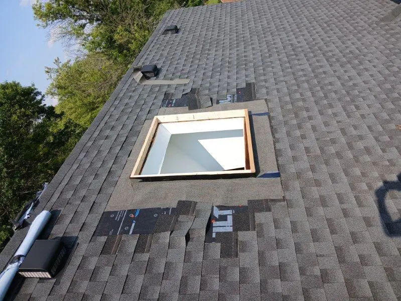 Skylight repair with new flashing installation on asphalt shingle roof in Lexington KY