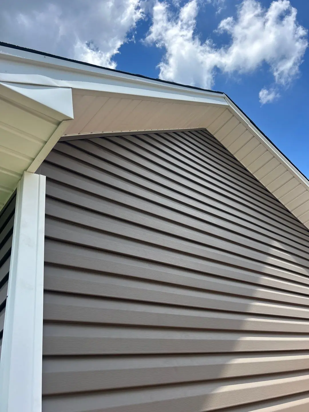 Vinyl siding on gable exterior wall of home in Lexington KY
