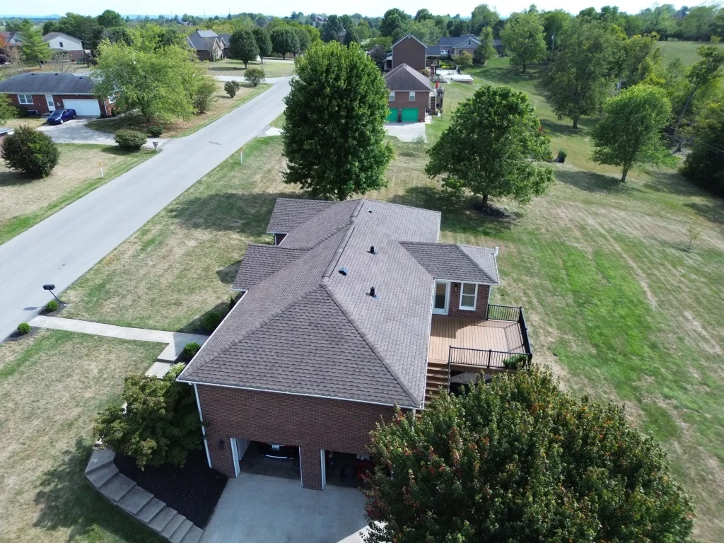 Aerial view of new asphalt shingle roof on home in Richmond KY with clean lines