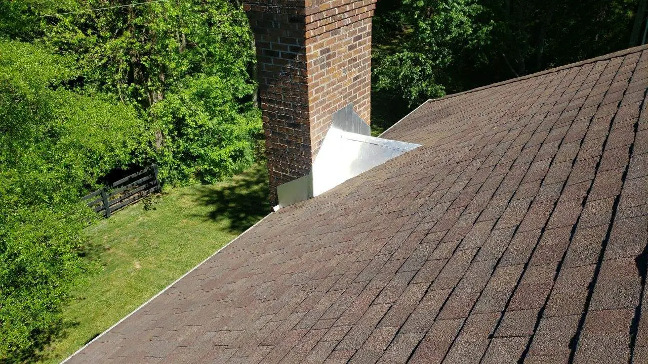 Chimney Flashing Inspection on Louisville Roof Chimney with flashing installed on roof in Richmond KY for leak protection