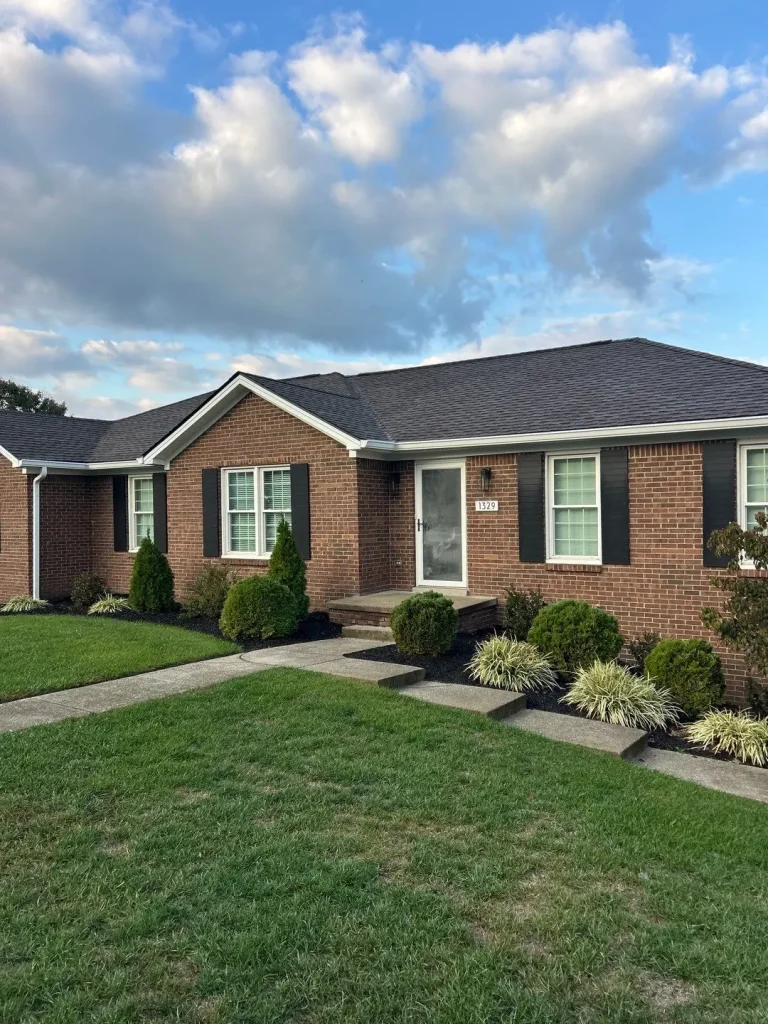 Residential home with completed roof repair and new asphalt shingles in Richmond KY