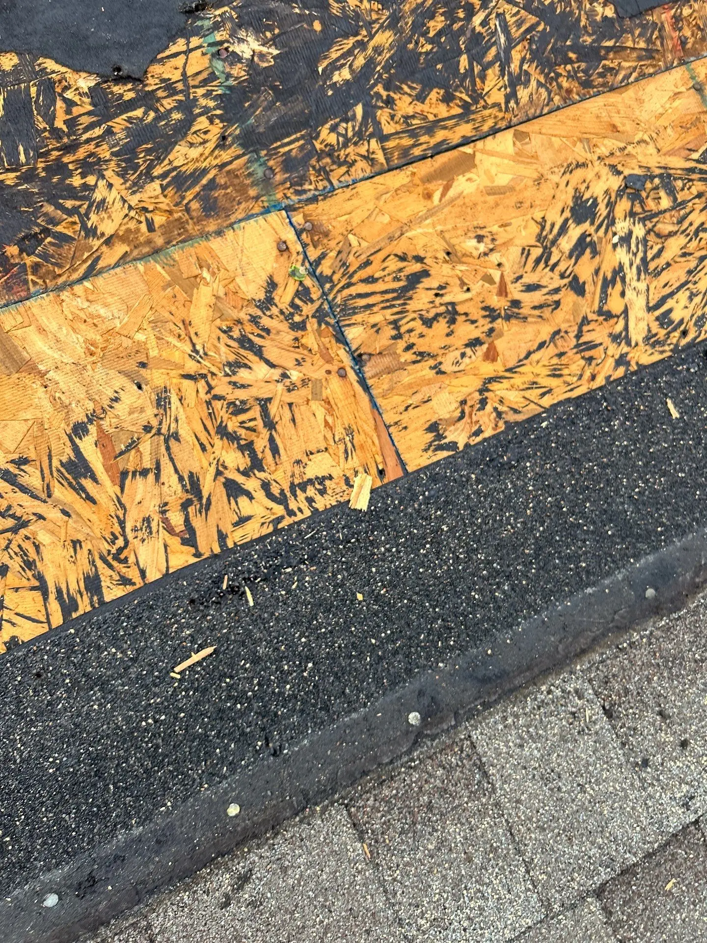 Exposed OSB roof decking during shingle replacement in Richmond KY