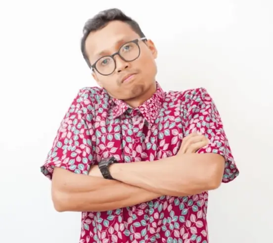 Frustrated commercial property tenant standing with arms crossed