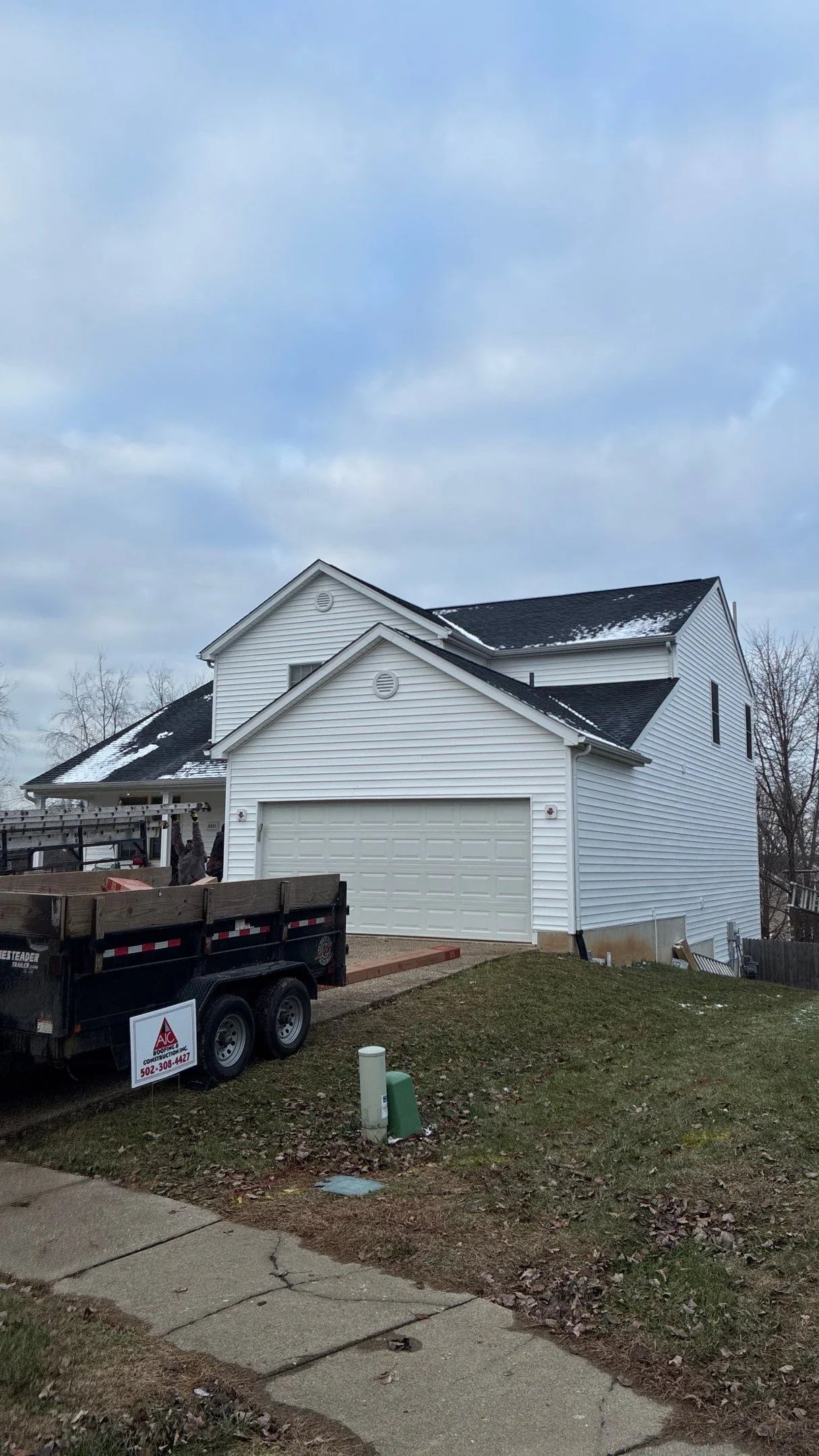 Completed siding replacement on a Louisville, KY home by AIC Roofing and Construction